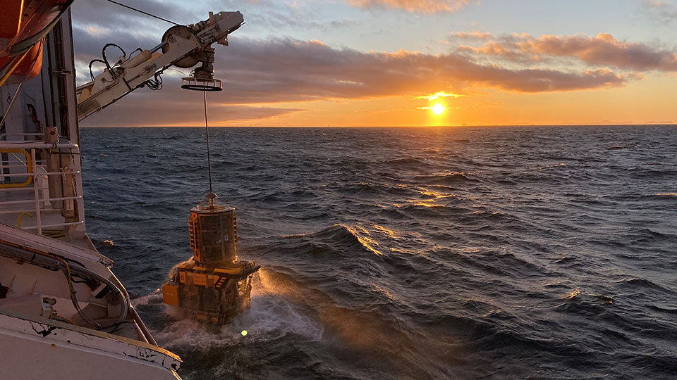 ROV launch offshore with sunset in the background